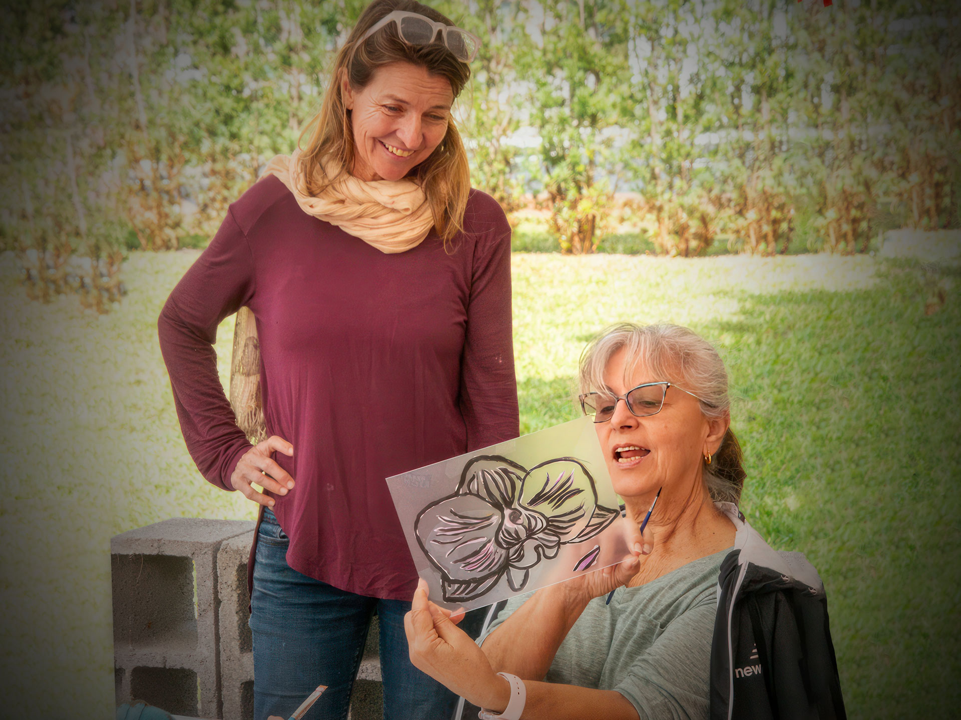 Gabriala Gamperl works with a student during an En Plein Air class.