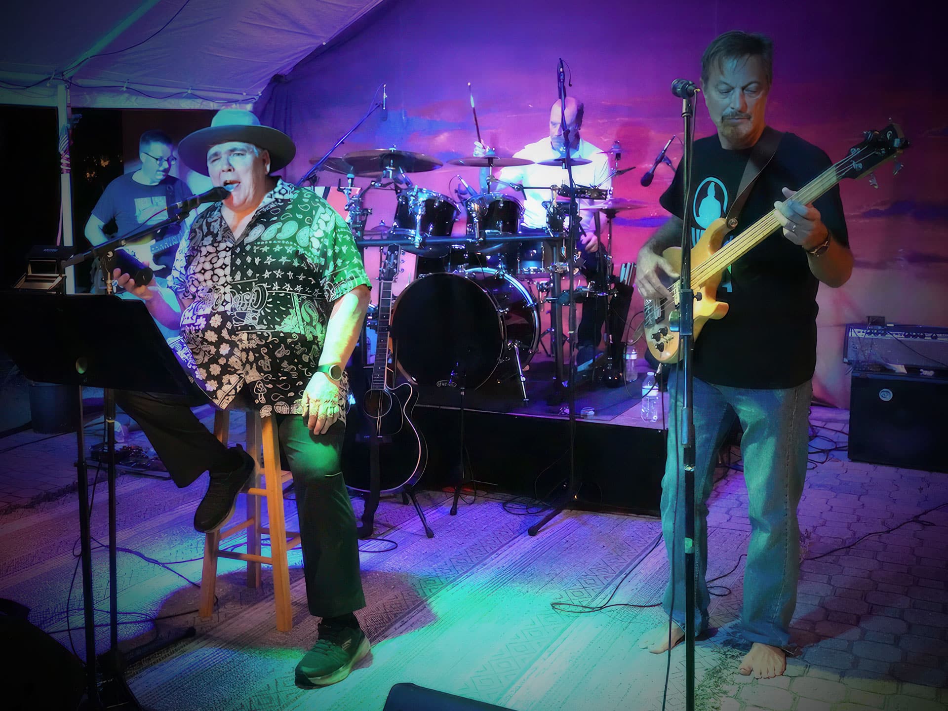 Bad Actors fronted by Steve Minotti perform during a Driveway Friday concert.